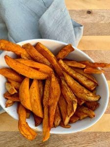 Sweet potato fries in a white bowl