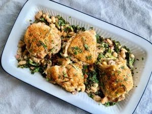 Instant Pot Tuscan Chicken in a white dish