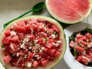 Watermelon salad with feta over arugula