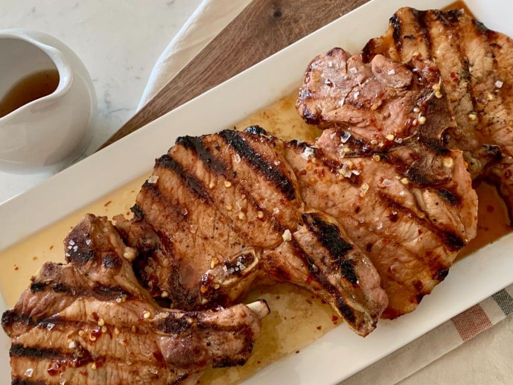 Grilled Maple Pork Chops on a platter