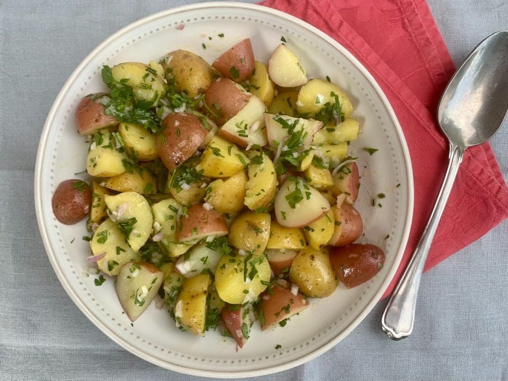 Warm Potato Salad with herb vinaigrette in a bowl