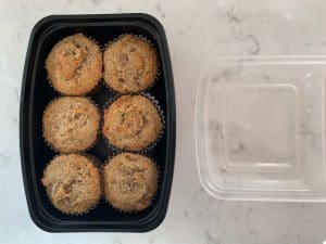 Carrot Cake Muffins in a freezer container