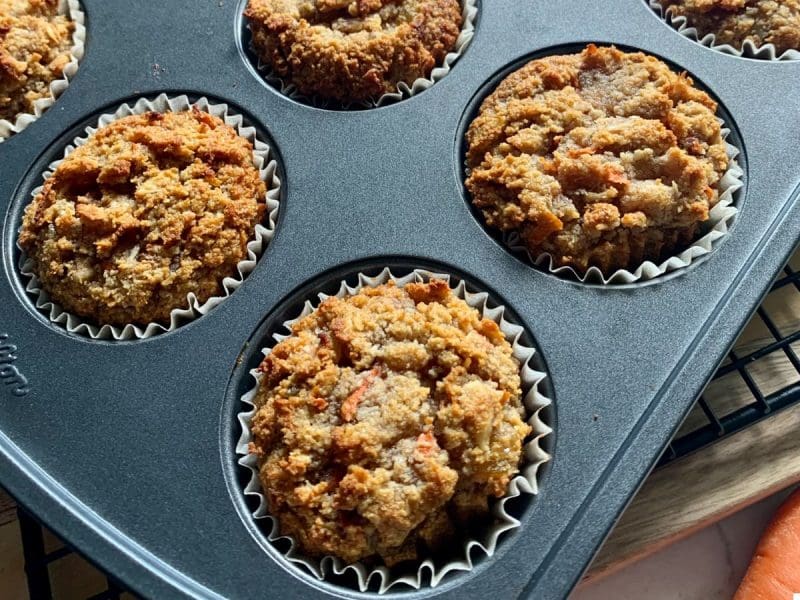 Bake almond flour carrot cake muffins in baking cups for easy storage