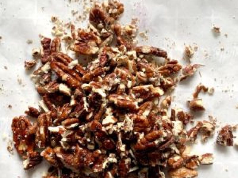 honey-glazed-pecans-chopped honey-glazed pecans on wax paper